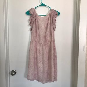 Adorable dress with ruffle sleeves.